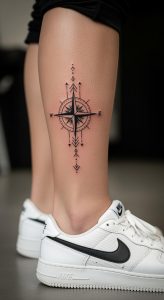 Bold black ink geometric compass calf tattoo with dotwork shading, clean lines, Nike sneaker, natural skin.