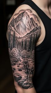 Detailed black and gray realism mountain landscape tattoo with stag, pine forest, river, muscular arm, tank top